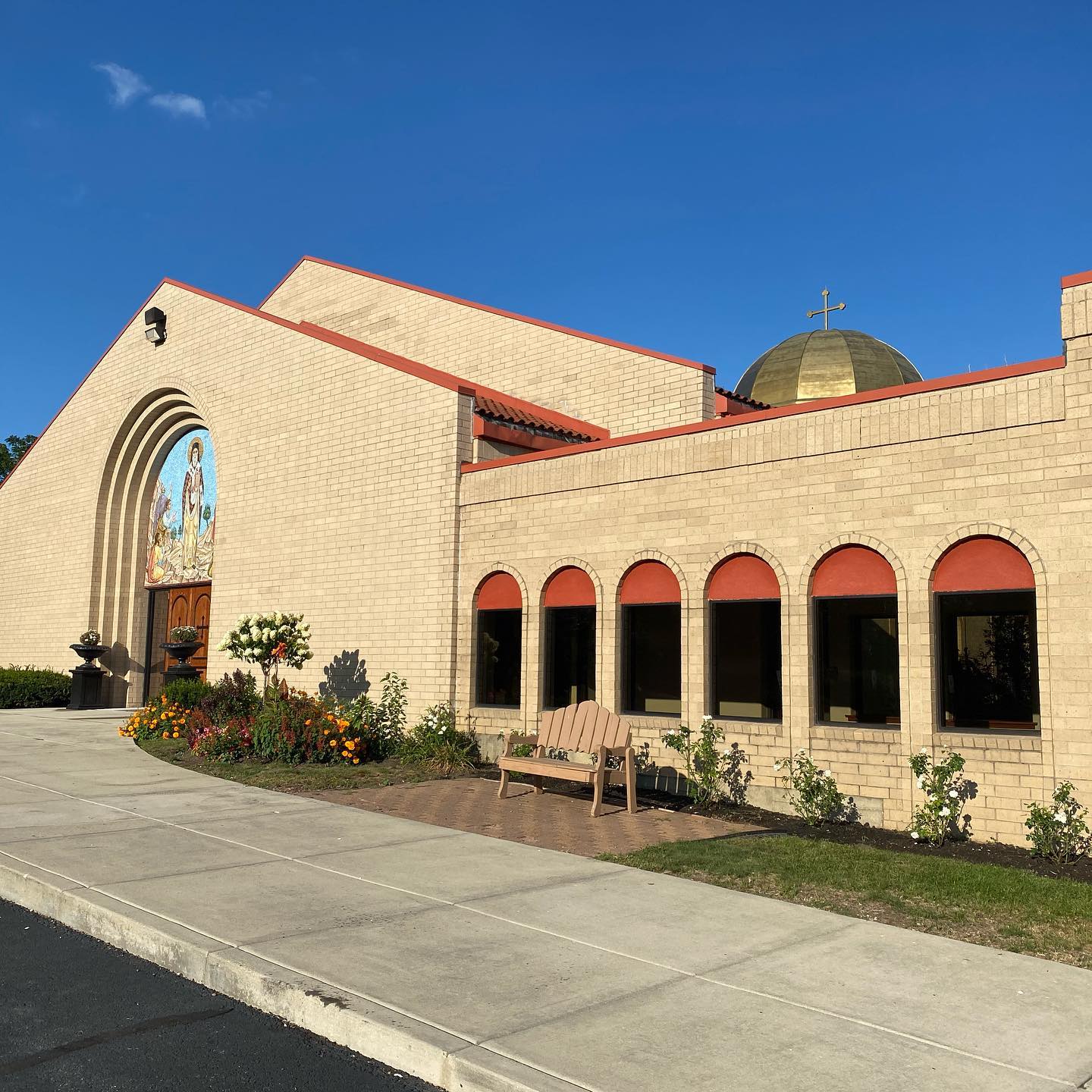 St-Nec-Web-Contact-A Exterior of St. Nectarios Greek Orthodox Church with its arched entrance