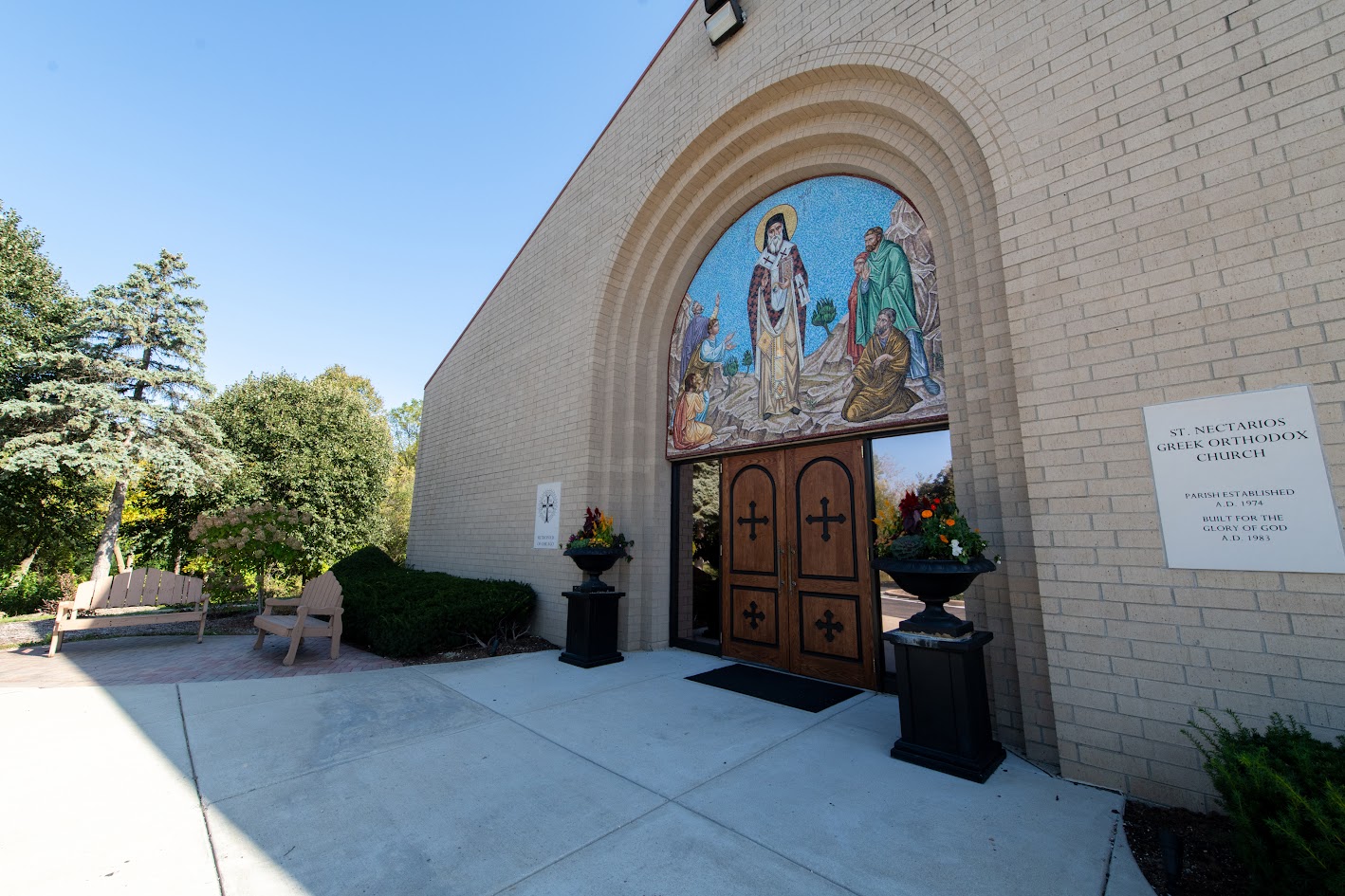 Entrance doors of St. Nectarios Greek Orthodox Church with the mosaic above