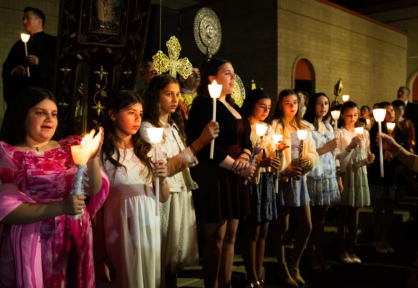 Children holding candles at Pascha